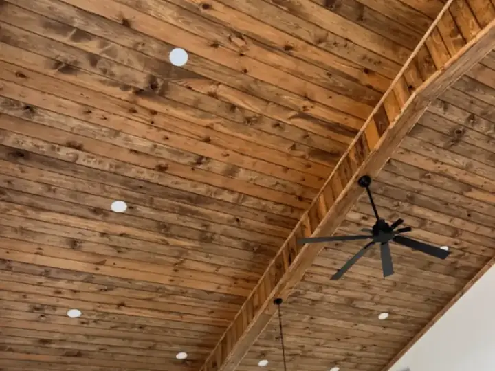 Rustic vaulted wood ceiling with exposed beam detail